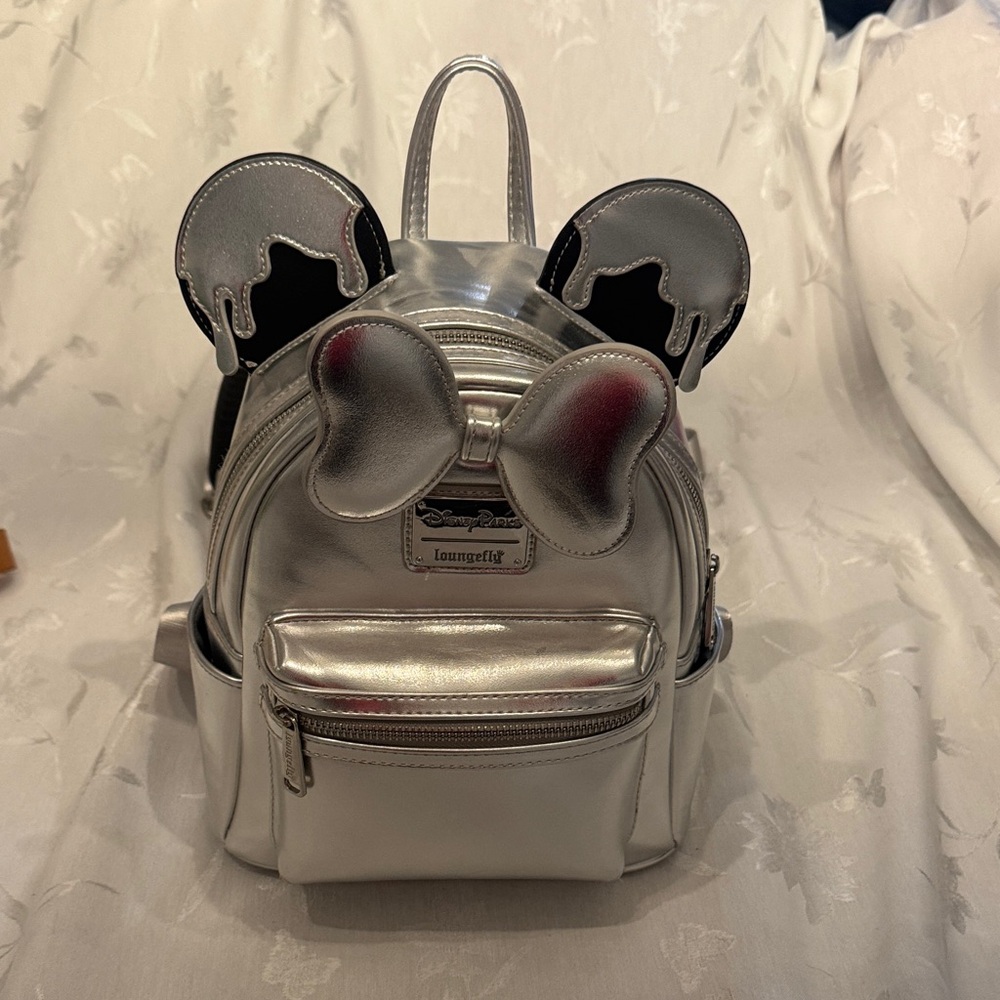 Loungefly Minnnie 100th Anniversary Metallic Silver Backpack.